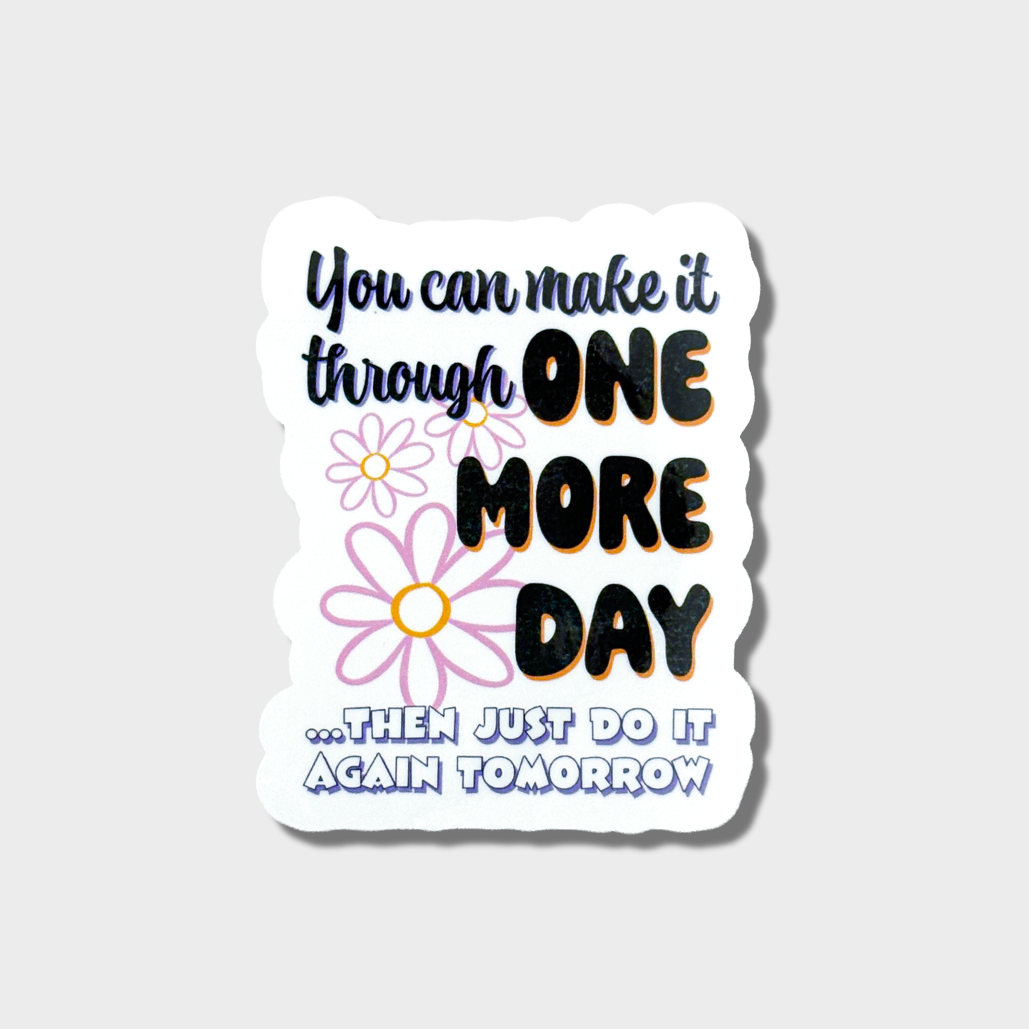 Motivational sticker with flowers and text on a gray background