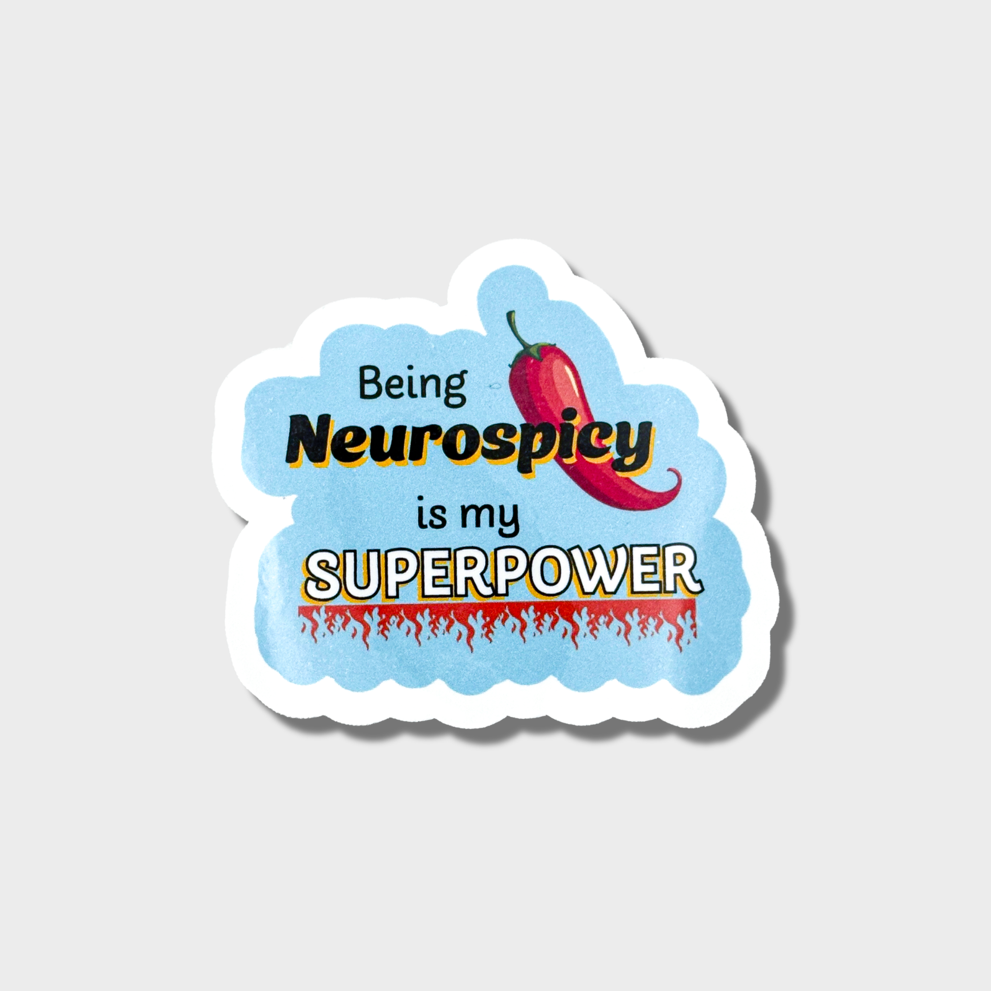 sticker with "being neurospicy is my superpower" on a light blue background