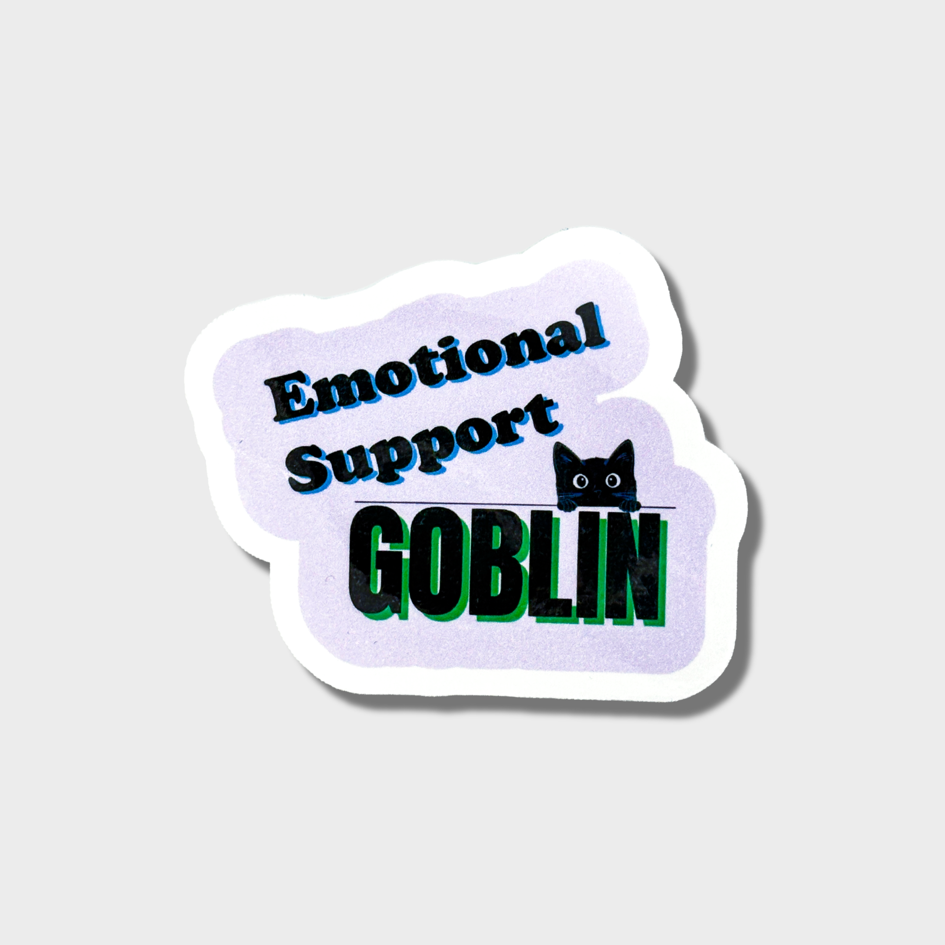 Sticker with 'Emotional Support Goblin' text and a cat icon on a light purple background
