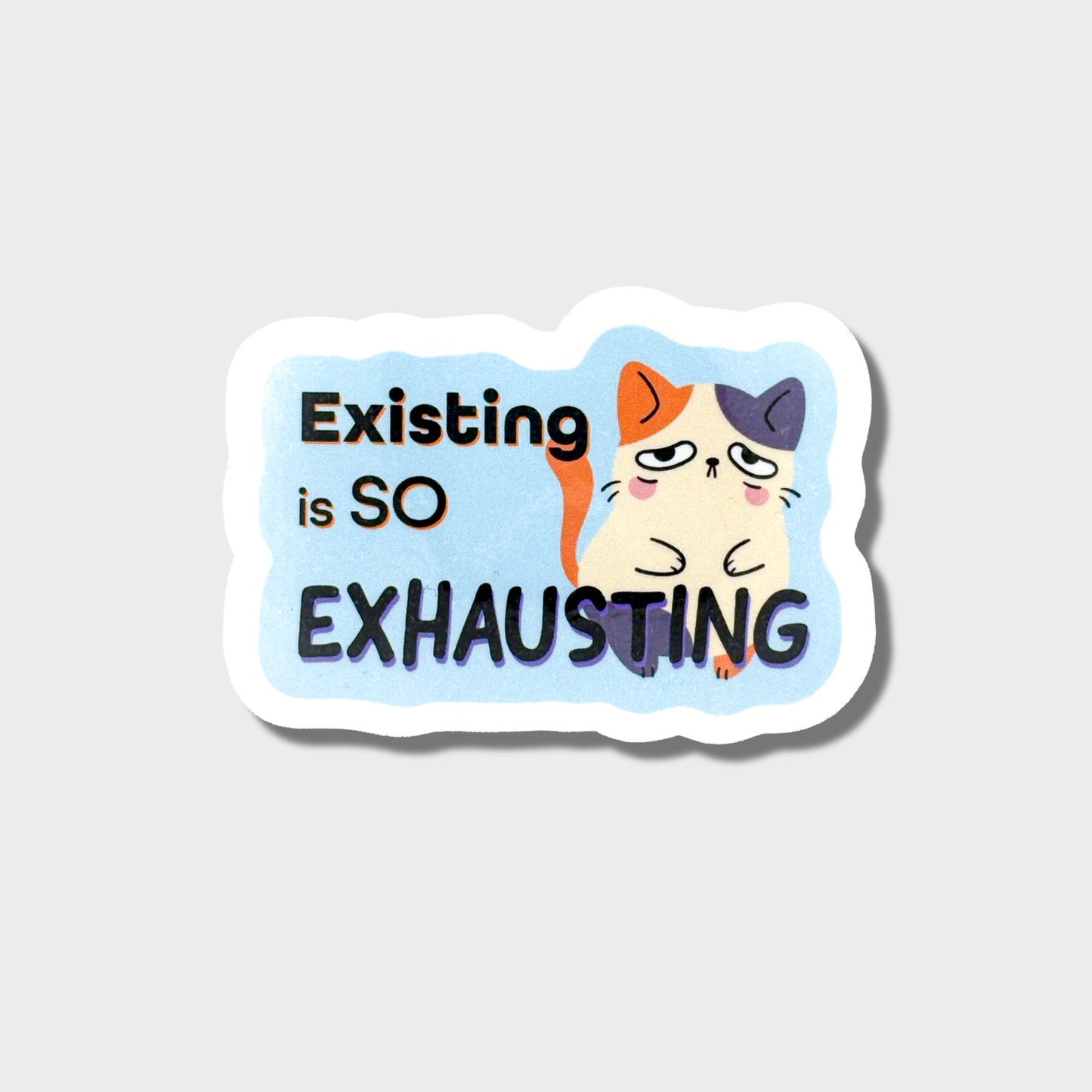 Sticker with a cat illustration and text 'Existing is SO EXHAUSTING' on a light gray background
