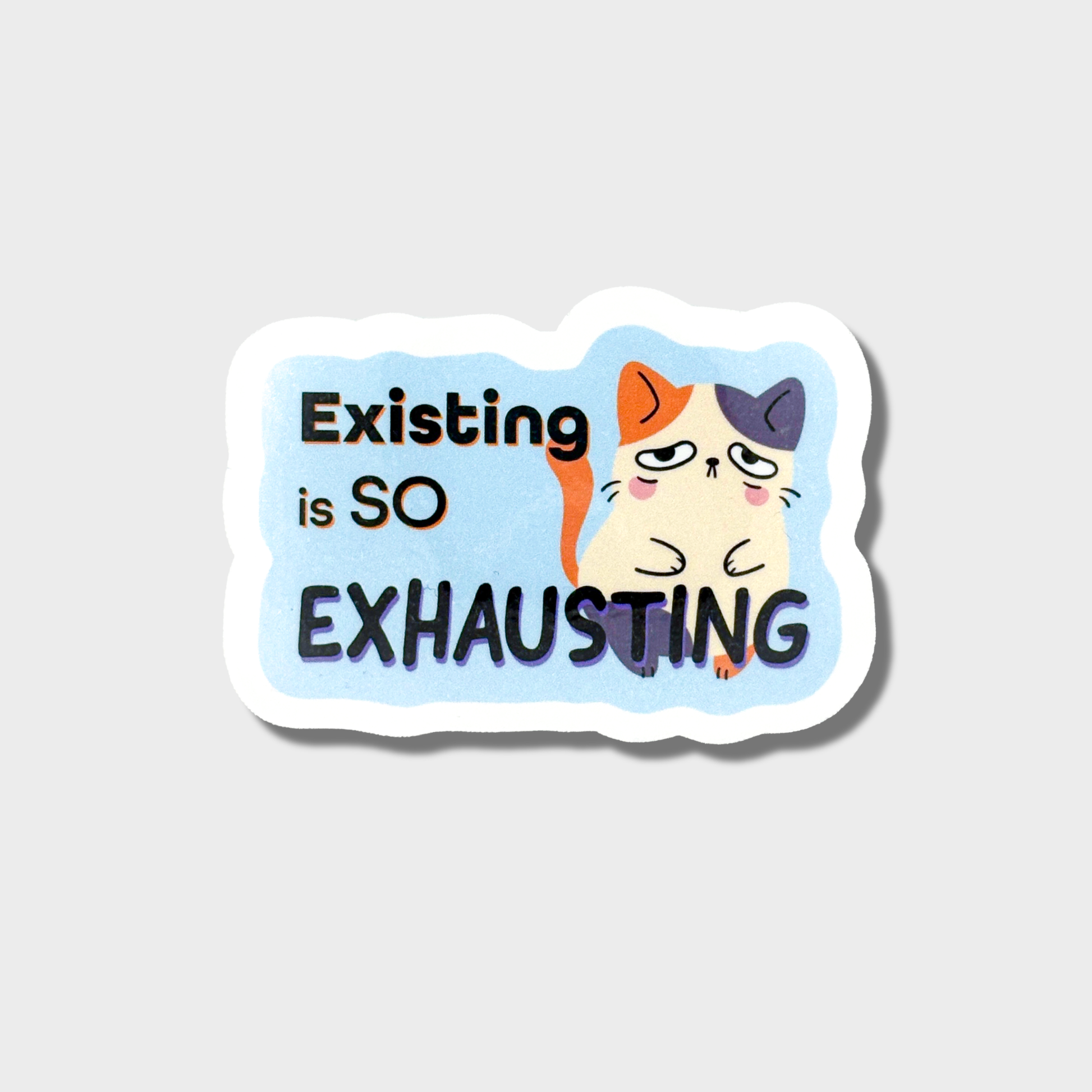 Sticker with a cat illustration and text 'Existing is SO EXHAUSTING' on a light gray background