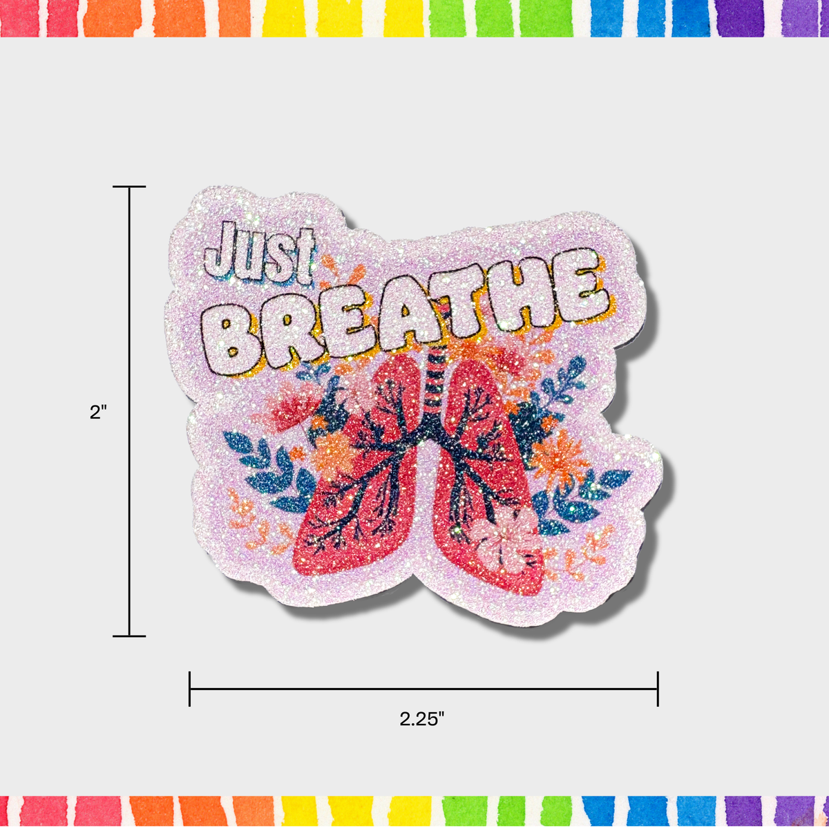 Decorative sticker with 'Just Breathe' text and lung illustration on a white background. Measurements are 2"x2.25".