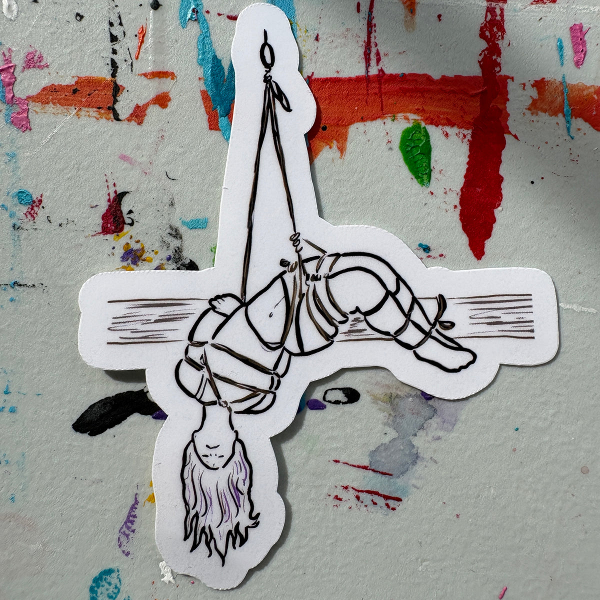 Sticker of a person in a rope suspension with abstract background