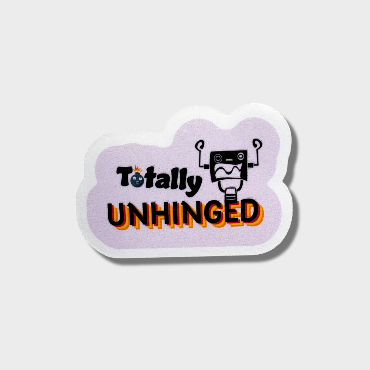 This sticker has the words "totally unhinged" with a robot graphic on a purple background